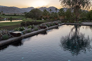 Darker water makes for a beautiful reflective view during sunset. StoneScapes Black pool finish is perfect for a natural oasis look.