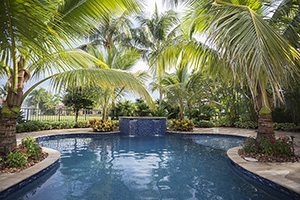 Palm trees and vibrant blue water are all you need for your backyard getaway! This pool owner used JewelScapes Yacht Club Blue to give that touch of sparkle for this tropical paradise.