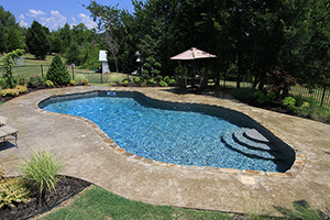 Forget what you think you know about vinyl pools. The materials used today offer versatility in size, shape, and color for the high-end look without the high-dollar cost.