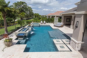 Decorate your pool with copper pits with decorative glass and water spillovers. The touch of glass makes the shimmering pool finish sparkle brighter.