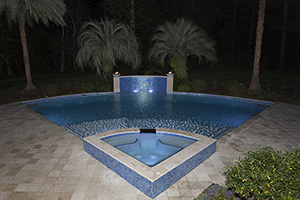 The coping of this Louisiana stunner allows the water color to take center stage. Finished in a plaster and boardered with NPT's Lightwaves Aquamarine tile, the pool is guaranteed to be inviting.