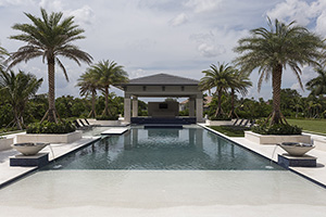 With a Cabana like this, you will feel like you are swimming at a Carribean resort. This grand pool features water bowls, tanning ledges and a beach entry so that you feel like you are stepping into luxary.